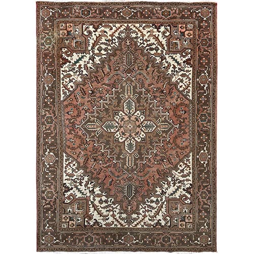 Hazelnut Brown With Ivory Corners, Vintage Persian and Heriz Design With Large Geometric Medallion, Evenly Worn, 100% Wool, Hand Knotted, Good Condition, Sides and Ends Professionally Secured, Cleaned, Abrash Oriental Rug